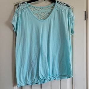 Turquoise top.